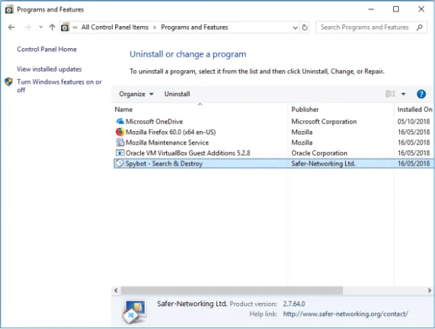 Official Spybot FAQ example with Spybot Search and Destroy selected for uninstall in Programs and Features